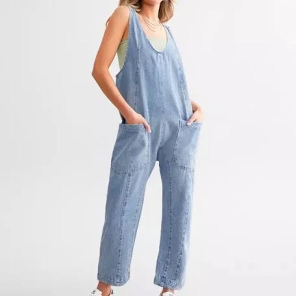 Free People We The Free High Roller Jumpsuit in a light blue wash Size Small